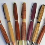 Fanned handcrafted wooden pens with metal trims