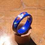 Blue enamel ring with floral inlay