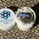 Blue opal memorial ring in white container