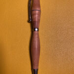 Hand-turned wooden pen with metal clip