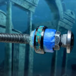 Threaded bolt with blue tape and patina ring