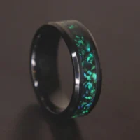 Black ring with green opal inlay