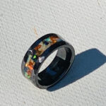 Black ring with colorful opal inlay