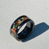 Black ring with colorful opal inlay