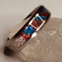 Silver ring with blue and red stone inlay
